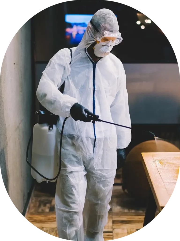 worker spraying table